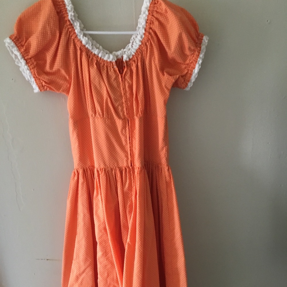 Orange polka dot dress with lace